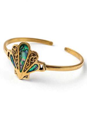 Aabha brass cuff bracelet front view showing the open adjustable band and iridescent shell inlay