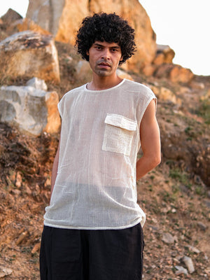 Man wearing the Aeson T-Shirt, a natural open-mesh cotton tank with a flap chest pocket, front view