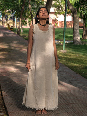 Afra Maxi Dress cream sleeveless maxi full front view on paved park path
