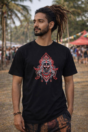 Close-up of the Devi UV reactive print, magenta cyan and purple deity line-art on a black tee