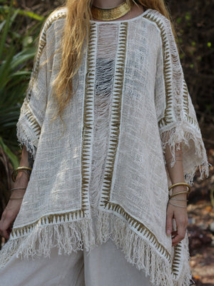 Esha Kaftan in natural cream, front view of the ladder-stitch panel and woven zigzag trim