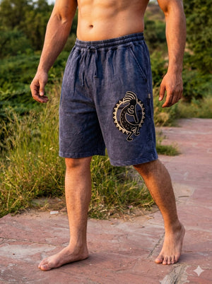 Back view of the Nimit Shorts in blue cotton, showing the elasticated waist and two patch pockets