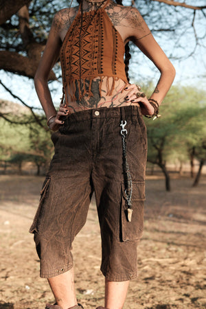 Front of the cotton cargo jorts showing the metal waist button, front placket and full-length flap cargo pocket