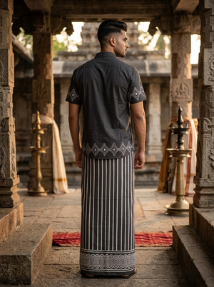 Back of grey Vana Shirt showing plain back panel and yoke seam, printed cuffs visible at the sleeves.