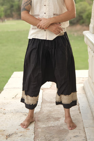 Black Yogi Palazzo Pants, front view with gathered elastic waist and chevron trim