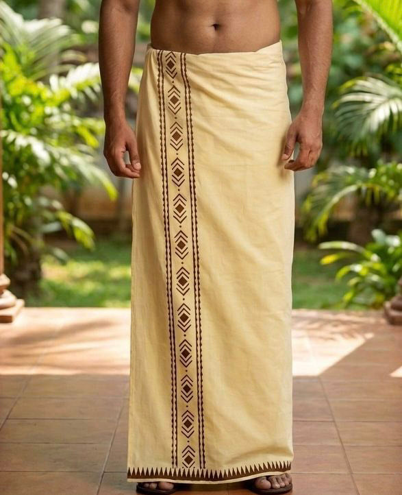 A man stands outdoors wearing the Mehfil Dhoti in lemon yellow, featuring his upper body exposed. The traditional attire brings an ethnic touch to the scene, set against lush green plants and a tiled floor in the background.
