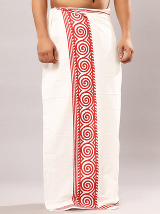 A person is wearing a white Tribal Dhoti decorated with a red Rajasthani hand block-print spiral pattern along the side. The background is light gray, partially obscuring the persons upper body.