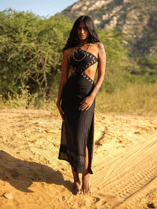 Aadhya black block print maxi dress, full-length front view standing in a dry golden field
