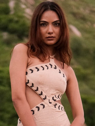 Close-up of the Aadhya cream block print maxi dress bodice showing the chevron trim and cut-out waist