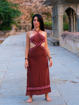 Aadhya maroon block print maxi dress, straight-on front view with hands at her sides on a terrace