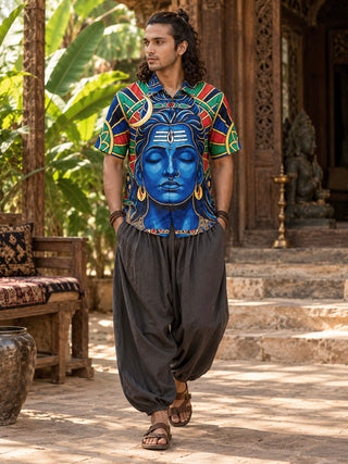 Man wearing Aadi Dev blue Shiva print short sleeve shirt with charcoal harem pants