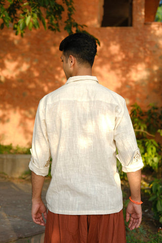 Back view of the off-white hand block print shirt for men, plain cotton back with rolled sleeves