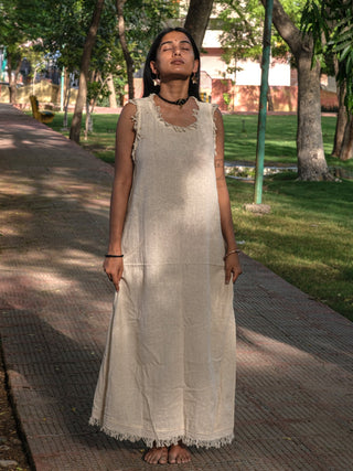 Afra Maxi Dress cream sleeveless maxi full front view on paved park path