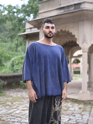 Aks-e-Rekha unisex oversized tee in indigo blue, full-length front view styled with grey harem pants