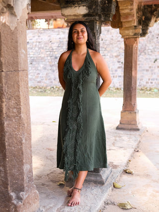 Alaya Dress black fringe maxi, standing pose in desert landscape, full length