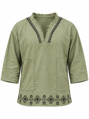 Flat lay green baggy kurta showing V-slit neck, two front patch pockets and hem print