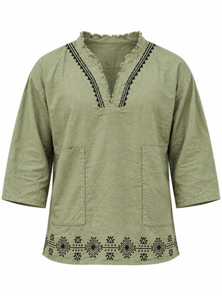 Flat lay green baggy kurta showing V-slit neck, two front patch pockets and hem print