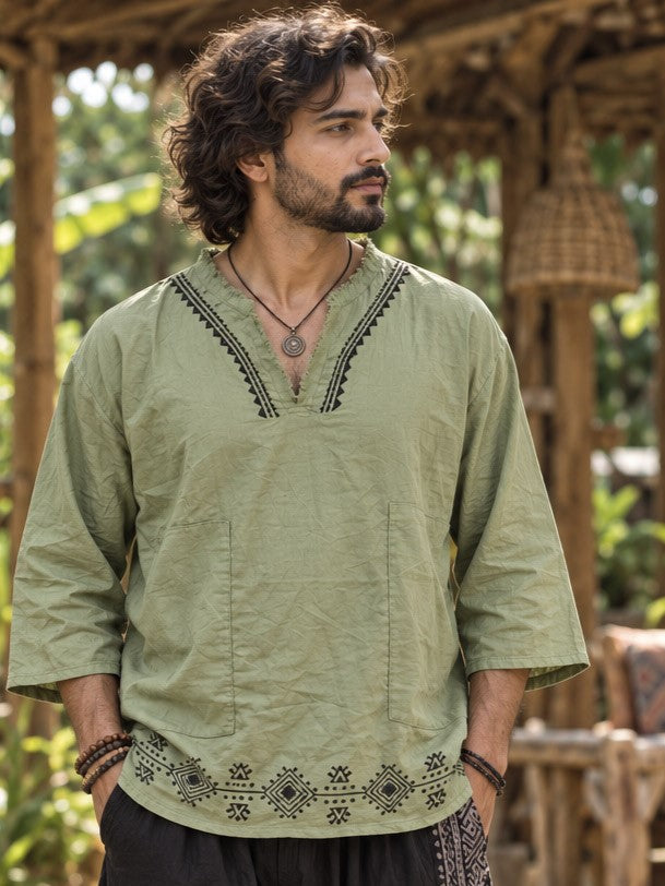 Green baggy kurta with block printed V-slit neckline and printed hem border