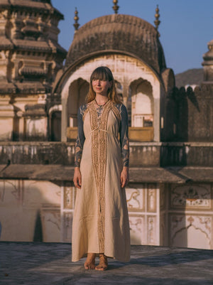 Beige Devi Maxi Dress with black sleeves layered look at heritage dome