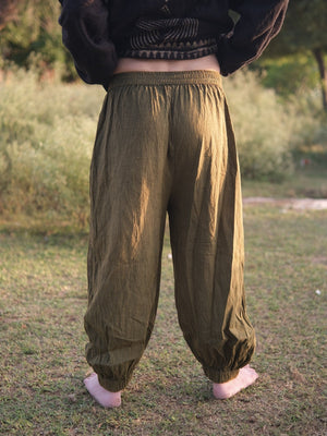 Back view of plain olive harem jogger pants with gathered elasticated ankle cuffs