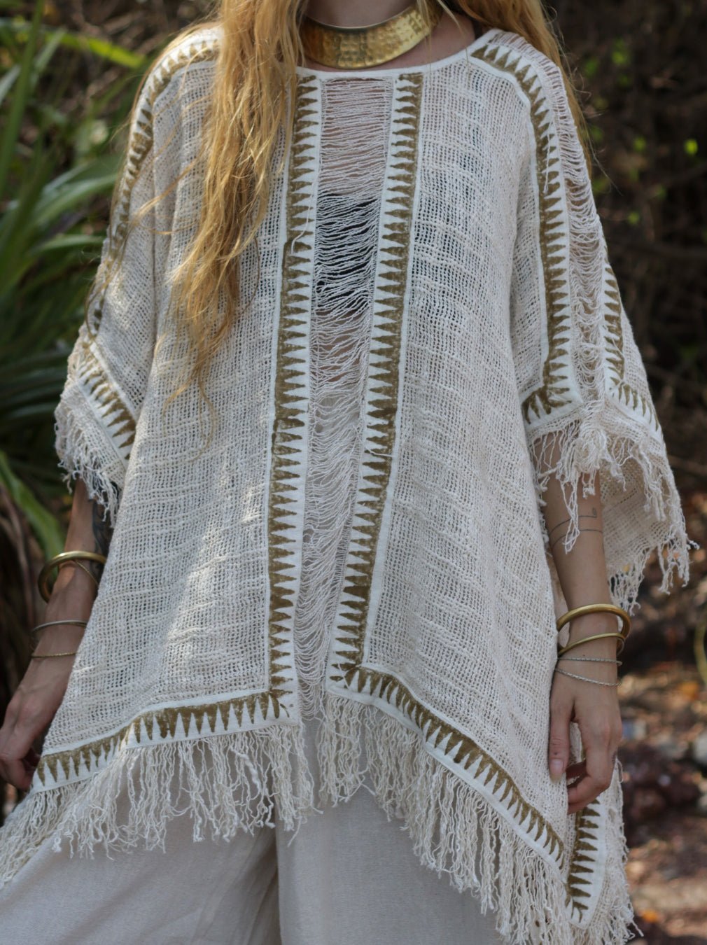 Esha Kaftan in natural cream, front view of the ladder-stitch panel and woven zigzag trim