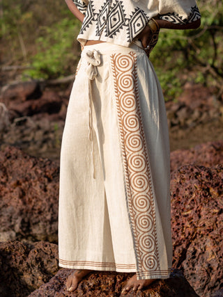 Fisherman wrap pants in natural cotton, tie-waist detail close-up, back view