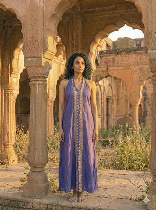 Idhika Dress in lavender purple, front view of the block print cotton maxi beneath haveli arches