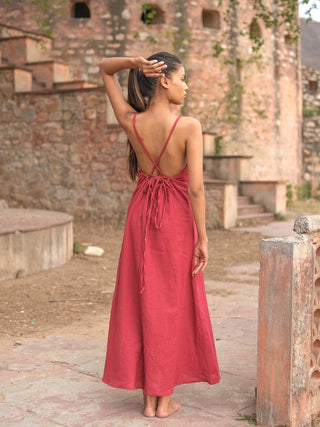 Idhika Dress in maroon, back view showing the tie waist of the cotton maxi at a haveli
