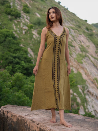 Idhika Dress in olive green, front view of the block print cotton maxi overlooking a valley