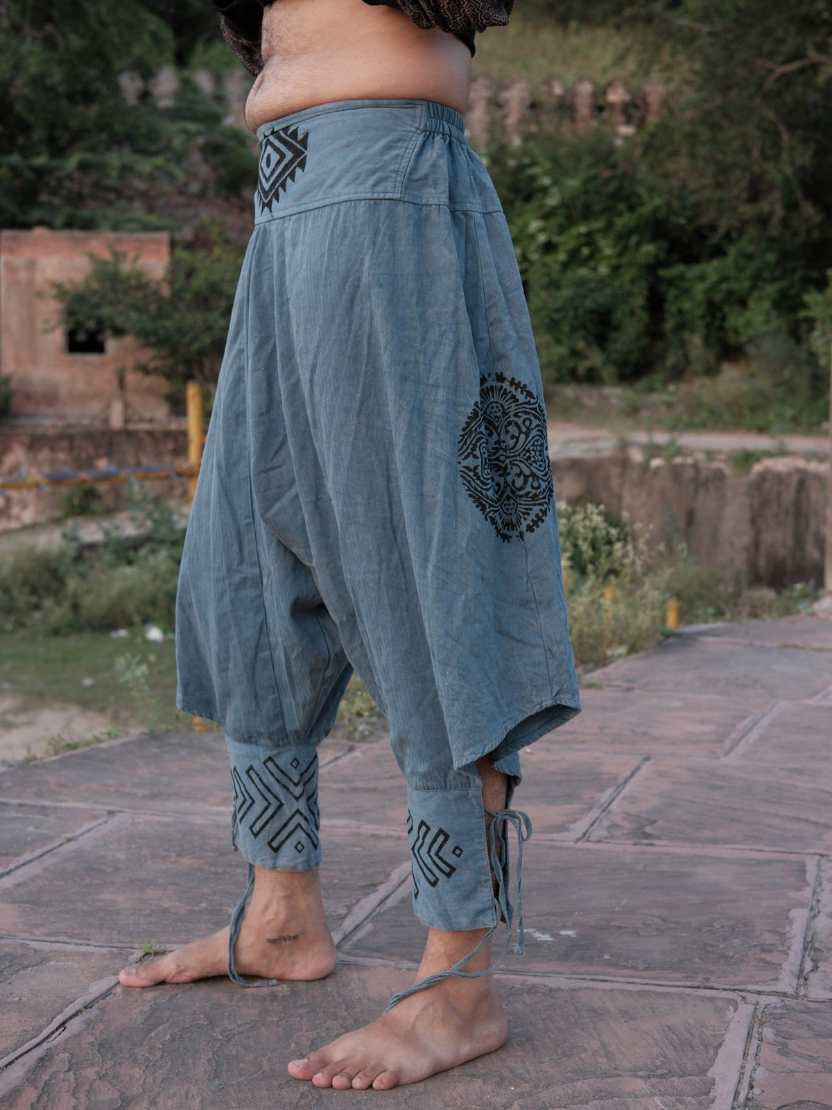 Kashf blue cotton harem pants in a three-quarter view, showing the relaxed drop-crotch shape