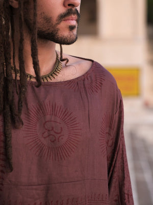 Maroon Om print kurta neckline close up with the sunburst medallion on the chest