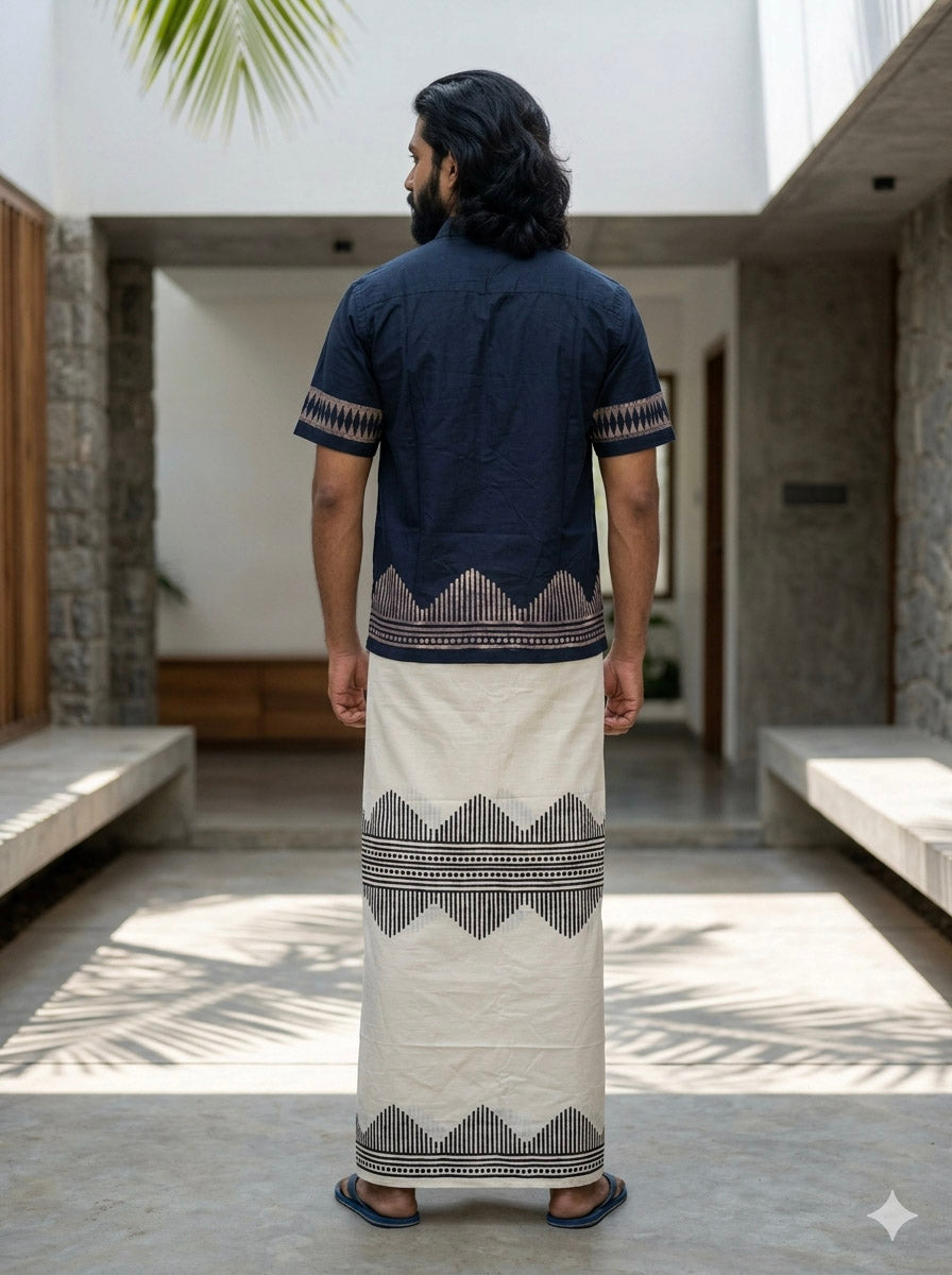 Back view of the Maruvam indigo geometric print cotton shirt for men, chevron hem border continuing across the back