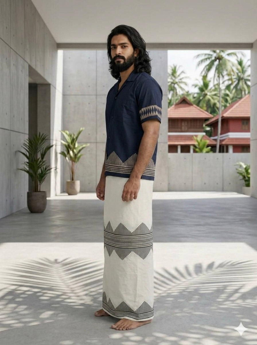 Three-quarter view of the Maruvam indigo cotton shirt for men showing the chest pocket, button placket and sleeve print