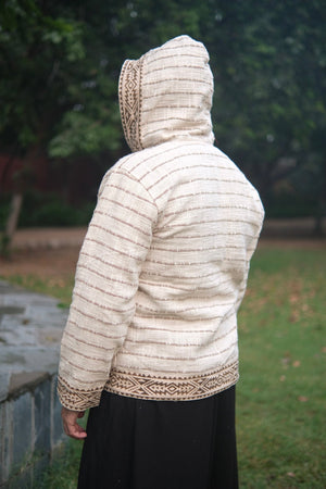 Back view of the Nomad hoodie, broken brown stripes across the body and a print band along the hem