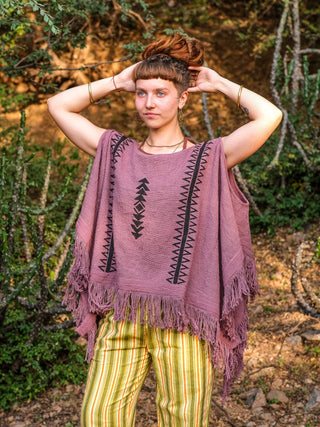 Parvati kimono in dusty mauve hand block print cotton with black motifs, model with hands in her hair