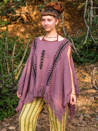 Parvati kimono in dusty mauve block print cotton with fringe trim, model standing in a relaxed pose