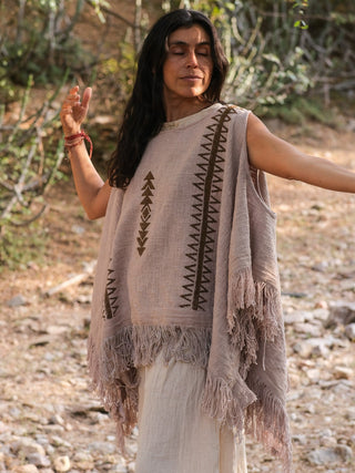 Grey-beige Parvati kimono in hand block print cotton, model with eyes closed and one arm raised