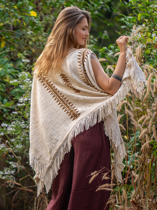 Back view of the natural cream Parvati cotton kimono showing the block print panel and fringed hem