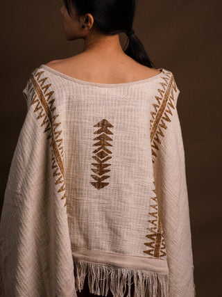 Back view of the natural Parvati kimono showing the hand block print motif and fringed hem