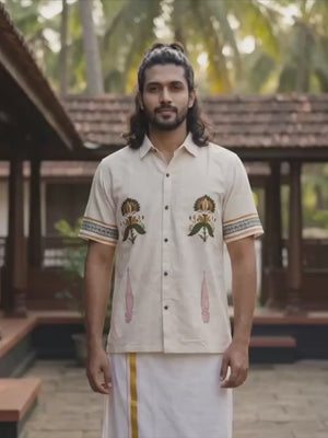 Vanamala handcrafted artisan shirt with floral embroidery worn with a white dhoti — video by Crystal Heal