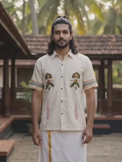 Vanamala handcrafted artisan shirt with floral embroidery worn with a white dhoti — video by Crystal Heal