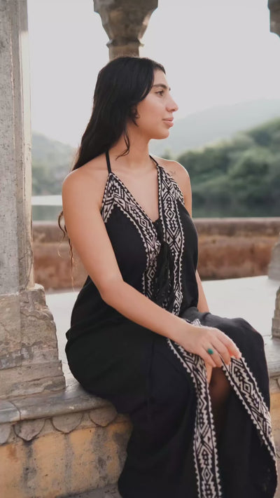 Devi Maxi Dress halter tie and front slit detail worn outdoors — video by Crystal Heal