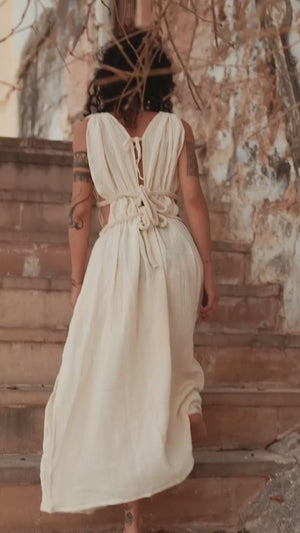 Kairo backless boho maxi dress with plunging neckline and tie waist worn by a model — video by Crystal Heal