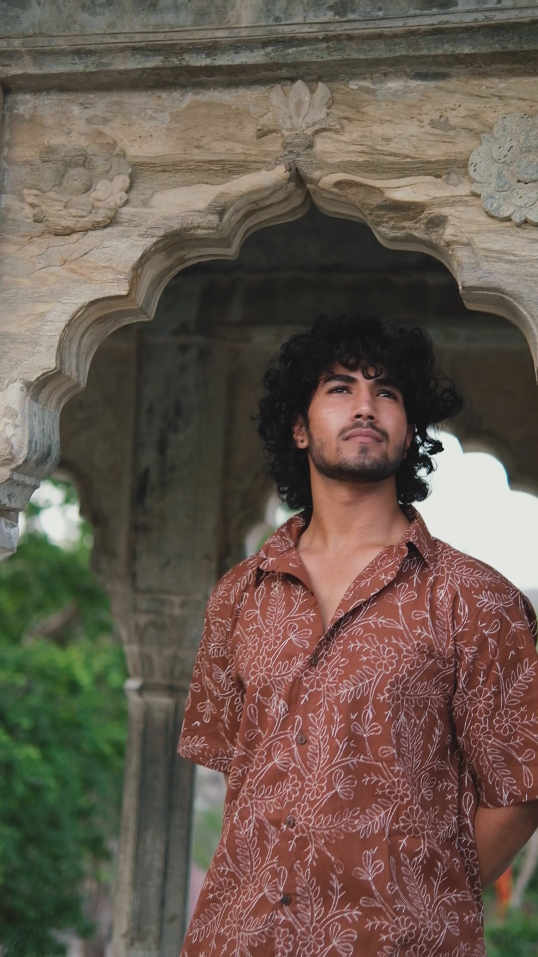 Video of the Akira Shirt in brown block printed cotton, worn and shown close up