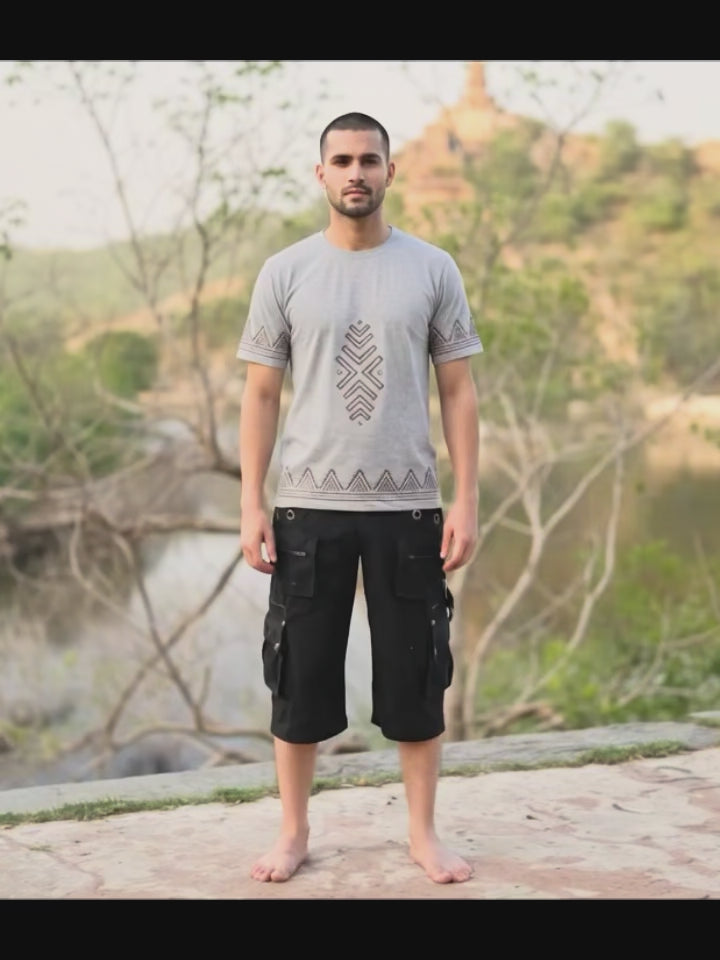 Axara unisex cotton tee with artisan geometric print worn by a model — video by Crystal Heal