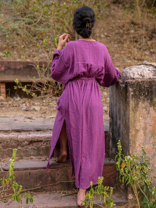 Purple crepe maxi dress back view climbing sandstone steps