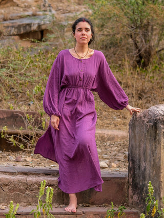 Purple button-front boho maxi dress worn on sandstone steps in Rajasthan