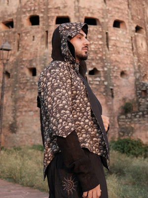 Raaz Jacket straight side profile showing the draped hood, knit sleeve and asymmetric pointed hem