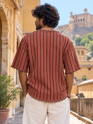 Rang Tee back view of the striped cotton tee, full stripe repeat and raw fringed bottom hem