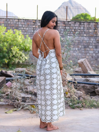 Back view of Sadhana cotton maxi dress showing criss-cross tie-up straps over block print